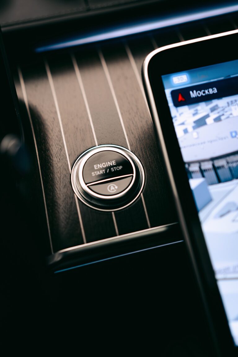 a close up of a cell phone on a car dashboard